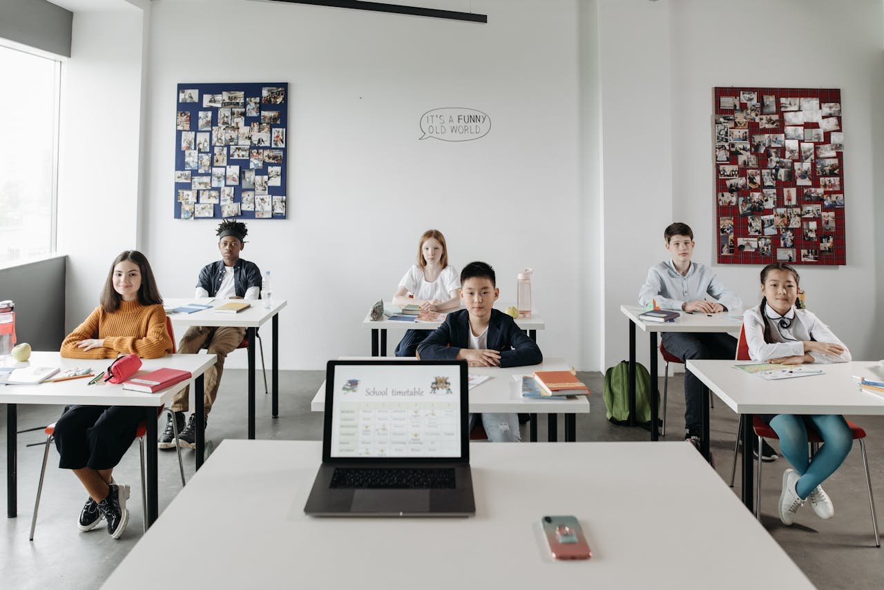 A classroom with diverse students focused and engaged in a learning environment.